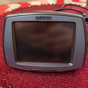 Garmin navigation system w/ car charger & instructional manuals & carrying case